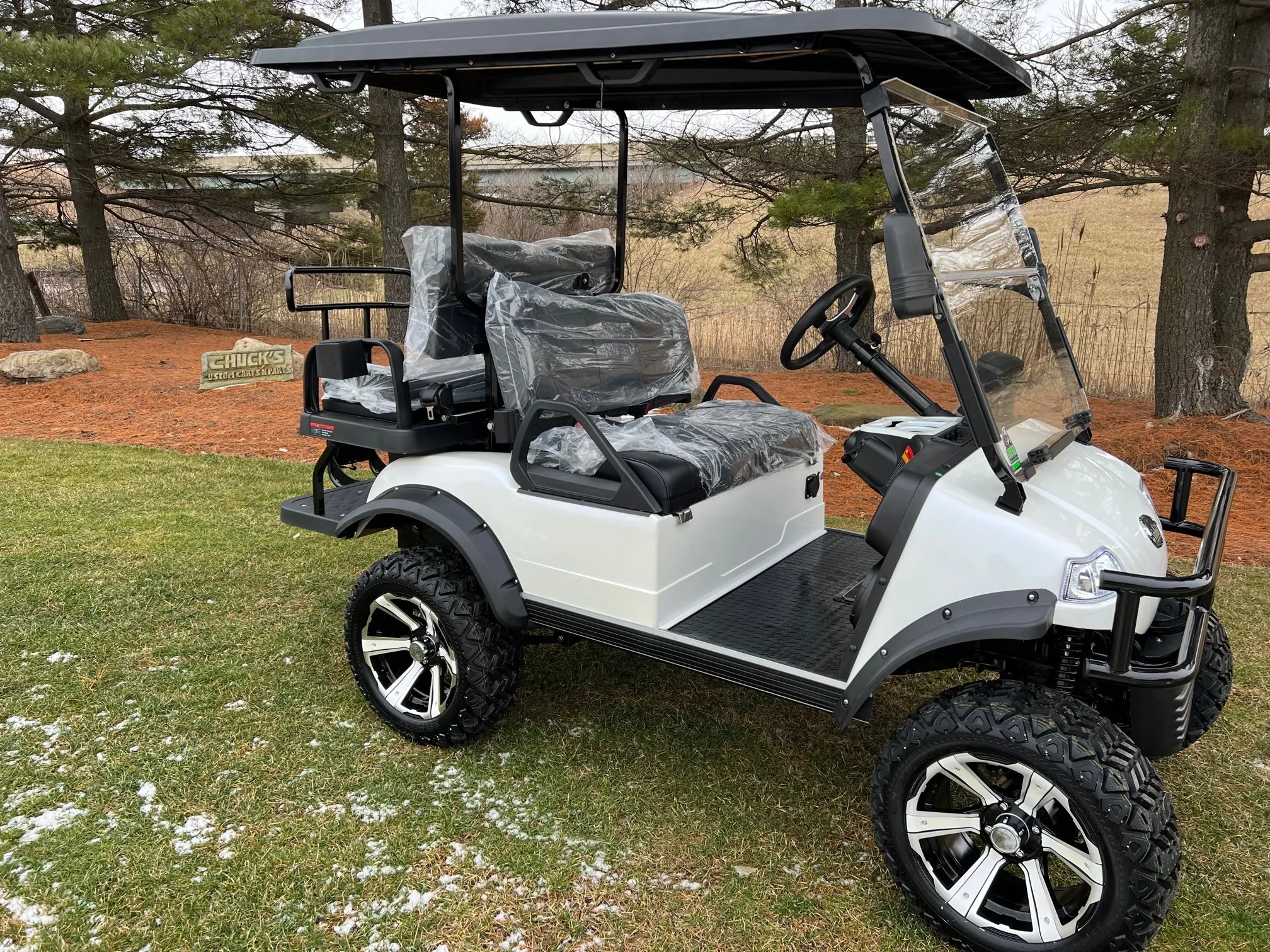 2025 Mineral White   Evolution Forester 4 Lithium Ion  Lifted Four Passenger